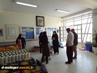 توزیع بسته های معیشتی توسط خیرین و کارکنان آموزشکده فنی و حرفه ای دختران ملایر  2