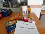 توزیع بسته های معیشتی توسط خیرین و کارکنان آموزشکده فنی و حرفه ای دختران ملایر  13